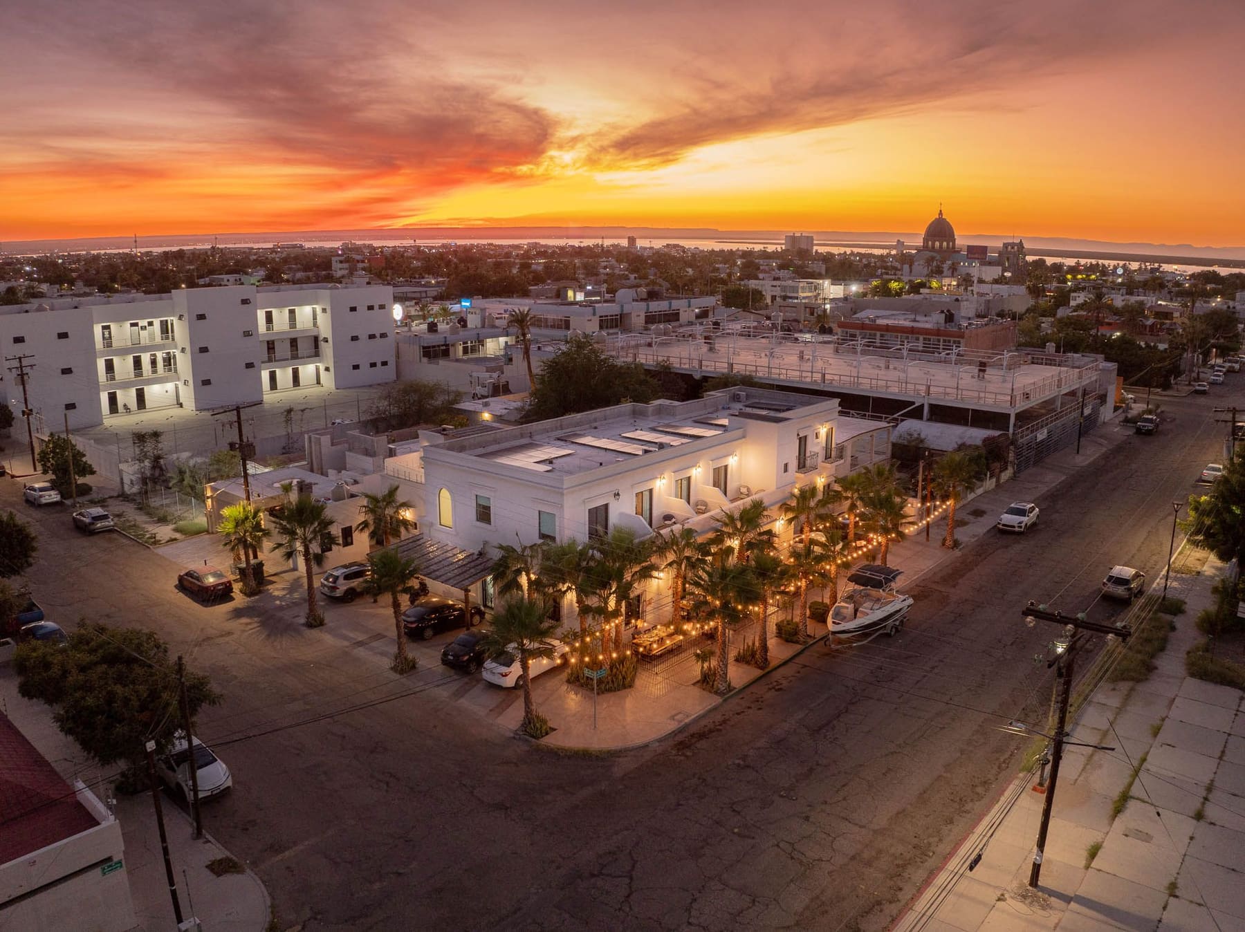 Hotel Casa Coronel at sunset in downtown La Paz, with the bay beyond
